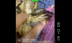 Mua gà về ăn, người phụ nữ phát hiện đầy giòi bám bên trong